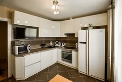 Kitchen Design With Refrigerator And Table