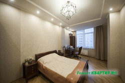 Жаңа ғимараттағы жатын бөлме суреті