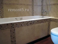 Photo Of The Bathtub Covered With Tiles