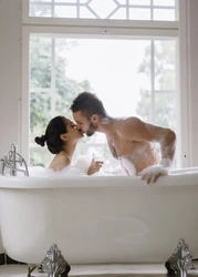 In The Bathtub With Steam Photo