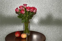 Photo of one rose in the kitchen