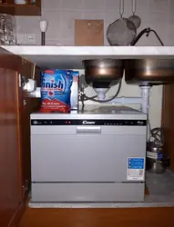 Dishwasher built into the kitchen photo