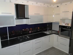 Kitchens with black top photo