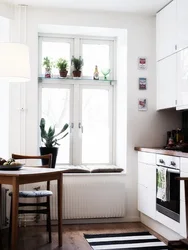 There are 5 windows in the kitchen photo