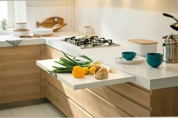 Photo Of Work Tables In The Kitchen