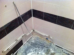 Photo Of Bathtub Tiles And Pipes