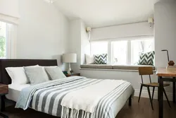 Narrow window in the bedroom photo