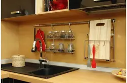 You can hang photos in the kitchen