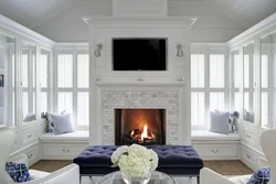 Living rooms with fireplace by the window photo