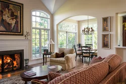 Living rooms with fireplace by the window photo