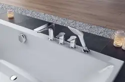 Bathtubs with built-in mixer photo