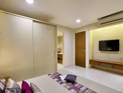 TV in the alcove bedroom photo