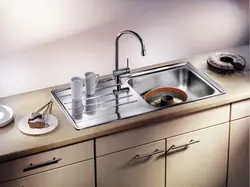 Photo of kitchen sink and table