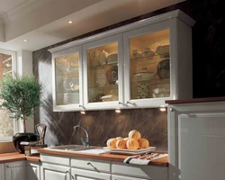 Kitchen utensils behind glass photo