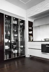 Kitchen utensils behind glass photo