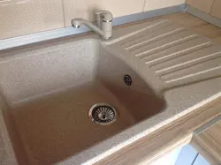 Light kitchen sink photo