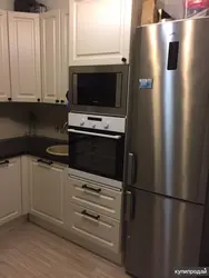 Kitchen oven with refrigerator photo