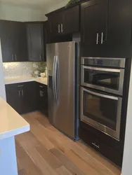 Kitchen oven with refrigerator photo