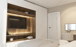 Bedroom Bed Opposite The Closet Photo