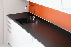 Kitchen with aluminum worktop photo
