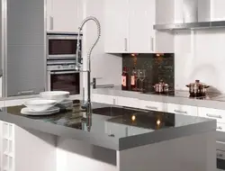 Kitchen with aluminum worktop photo
