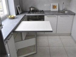 Kitchen with aluminum worktop photo