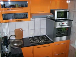 Kitchen with small oven photo