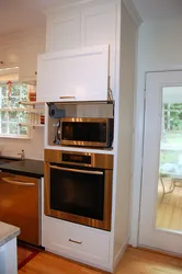 Kitchen with small oven photo