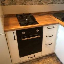 Kitchen with small oven photo