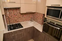 Kitchen with small oven photo