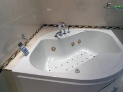 Corner faucet in the bathroom photo