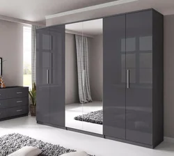 Dark wardrobes in the bedroom photo