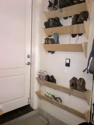 Shelves in a narrow hallway photo