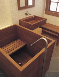 Wooden sinks and bathtubs photo