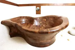 Wooden sinks and bathtubs photo