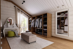 Dressing rooms in a wooden house photo