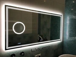 Touch mirror in the bathroom photo