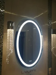 Touch mirror in the bathroom photo
