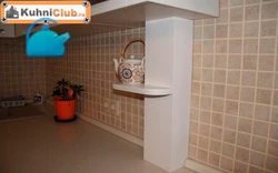 Photo of kitchen pipes in countertop