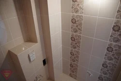 Box of tiles in the bath photo