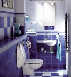 Toilet in the corner of the bath photo