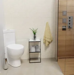 Toilet in the corner of the bath photo