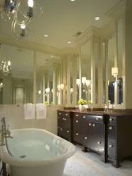 Bathtub with mirror wall photo