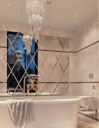 Bathtub with mirror wall photo
