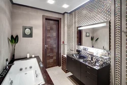 Bathtub with mirror wall photo