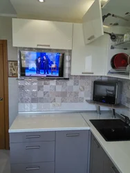 Kitchen Photo With Microwave And TV