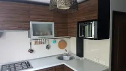 Kitchen Photo With Microwave And TV