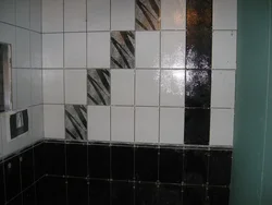 Photo of black seams in the bathroom