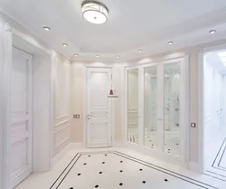 Hallway closet white doors photo