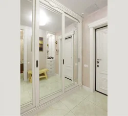 Hallway closet white doors photo